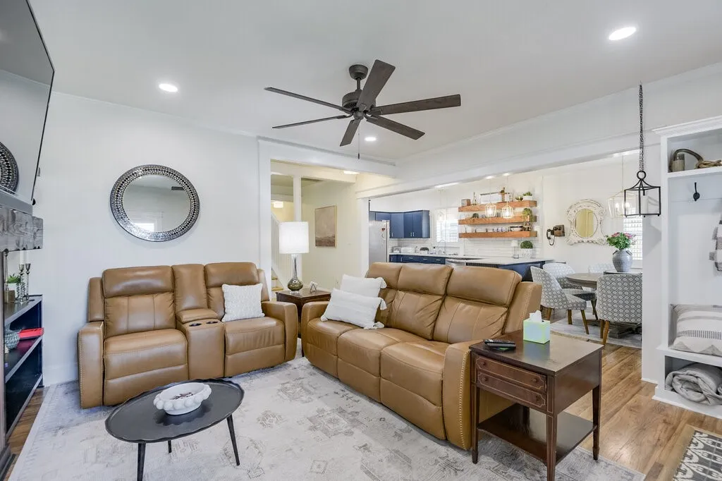 Recessed lighting, ceiling fan, wood-finish flooring, built-in shelving, and open shelving