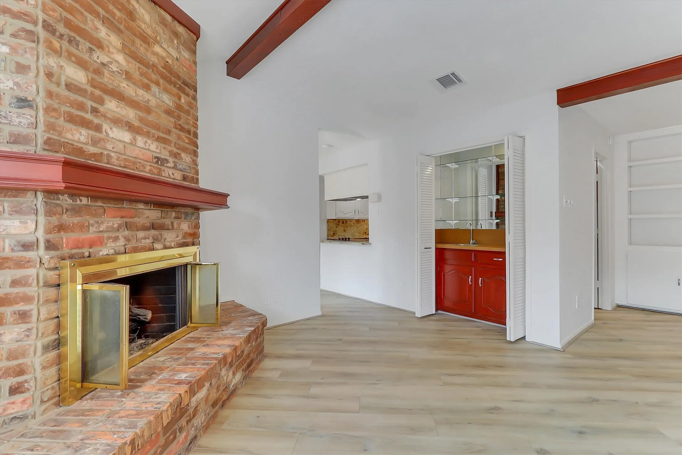 Easy access to kitchen and primary bedroom.
