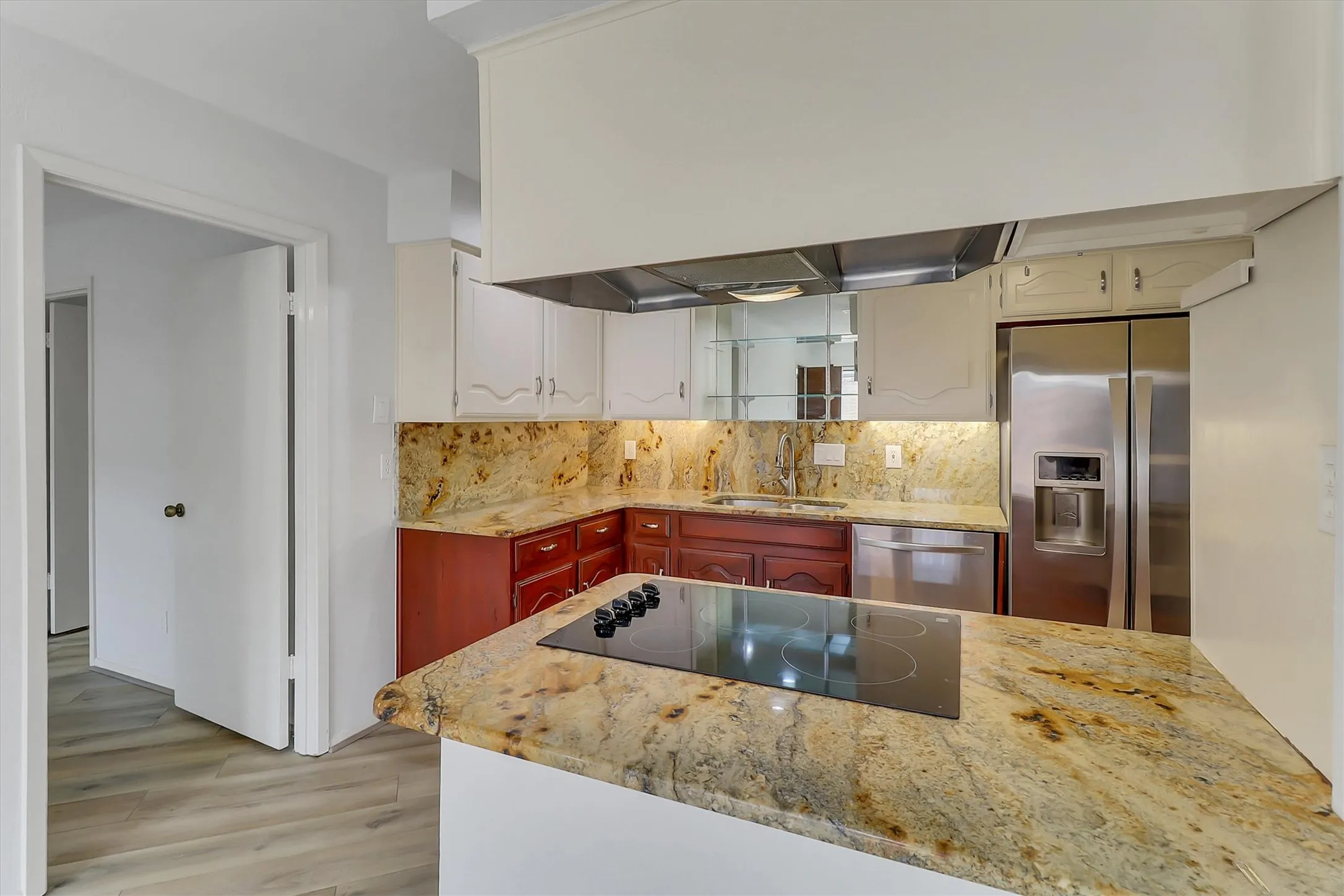 Kitchen overlooks dining room