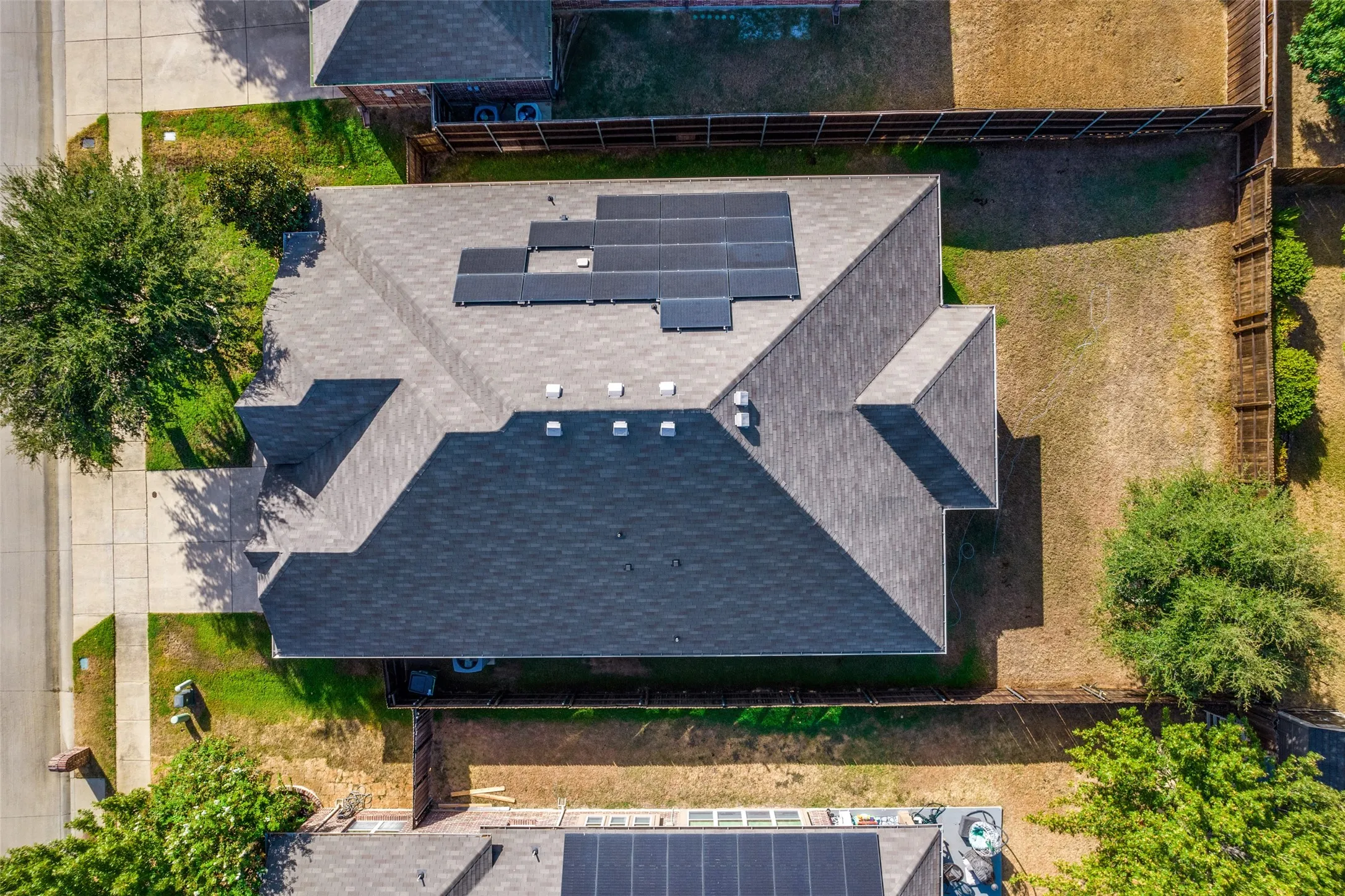 Architectural shingle roof with integrated solar panels
