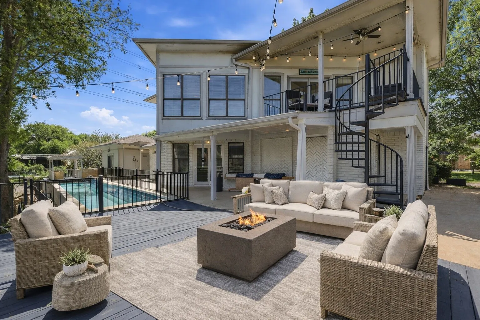 Virtually Staged with patio furniture on rear deck