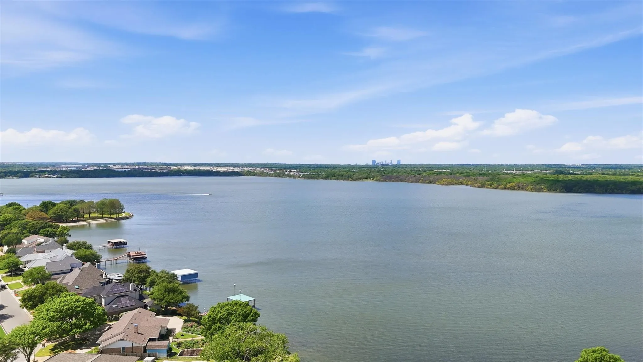Waterfront properties featuring private boat docks and covered slips
