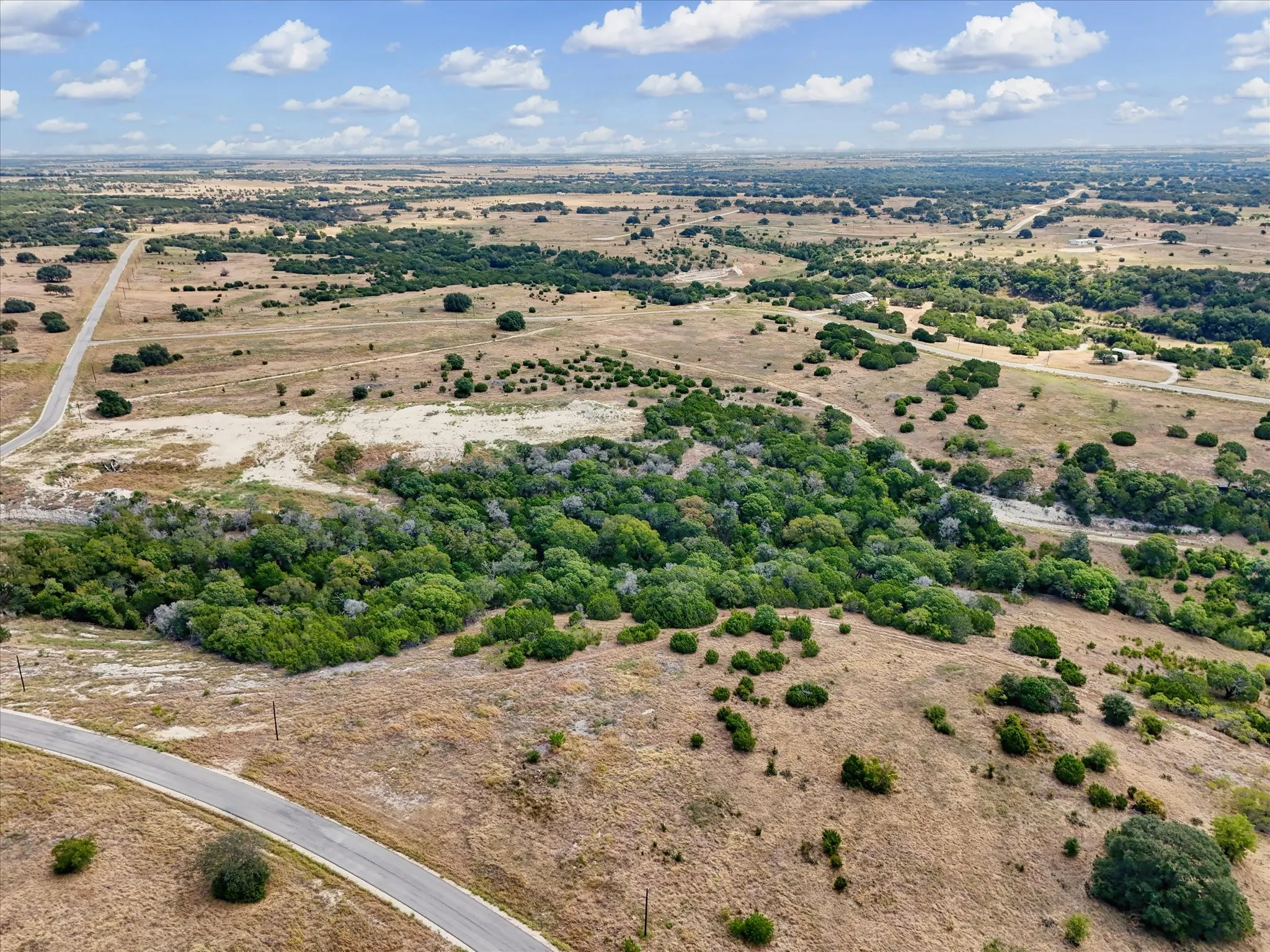 Expansive land offering diverse topography, mature trees, and natural vegetation