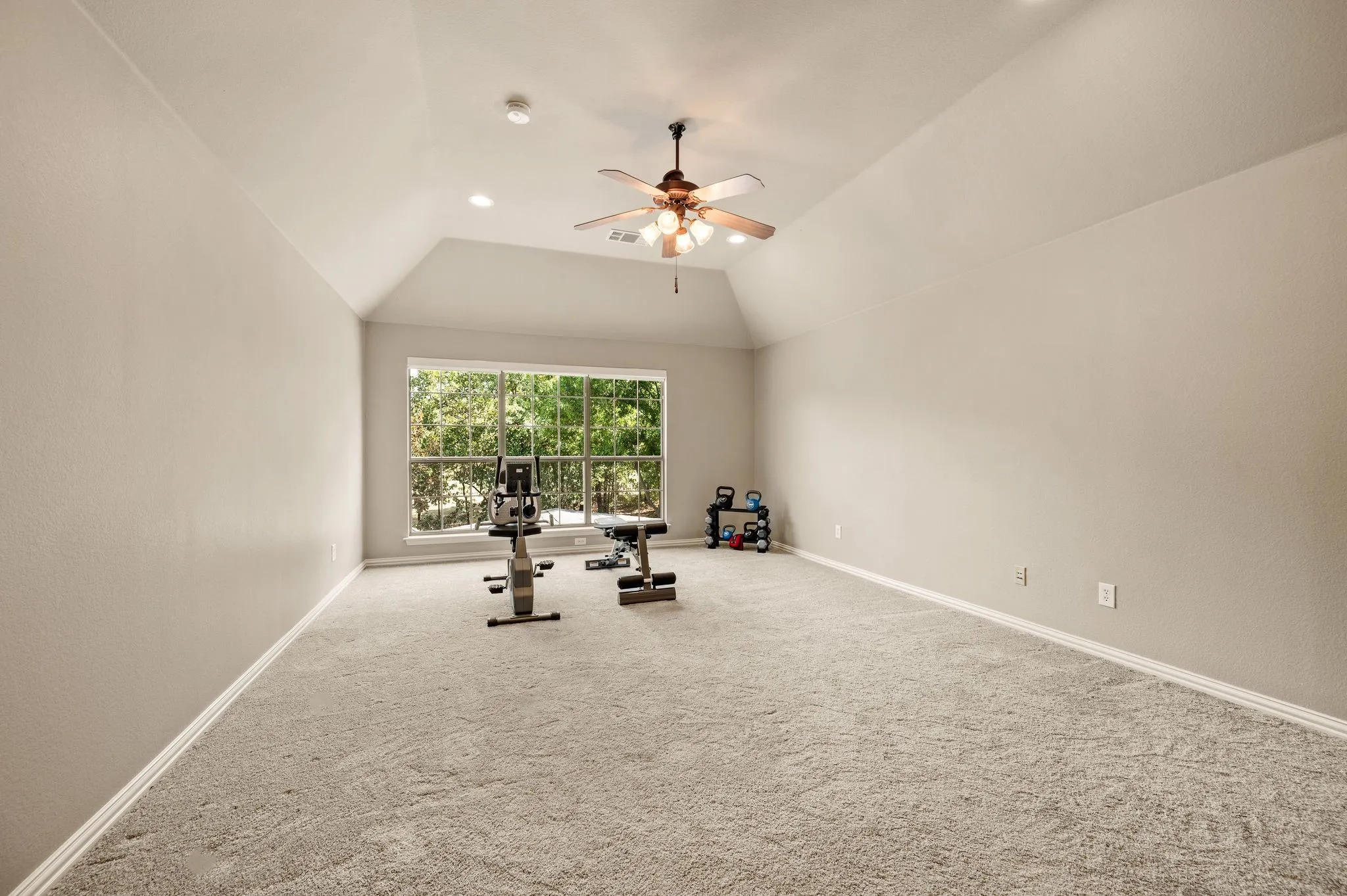 Large upstairs flex room provides plenty of space for recreation, exercise, entertainment or additional living. Just outside this room is a closet and a full bathroom, so feel free to use this space as a 5th bedroom if needed!