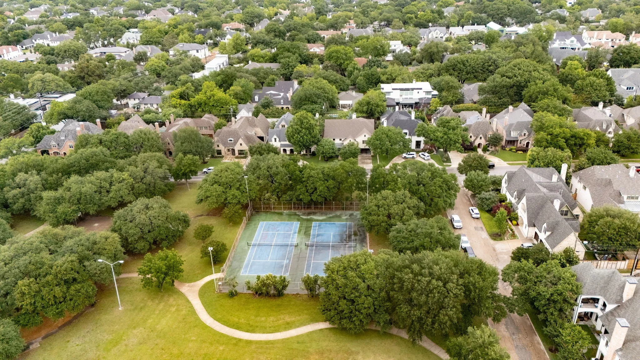 Located directly across from Preston Hollow Park with all of its amenities including, tennis courts, walking/running paths, playground, sports fields and pavilion.