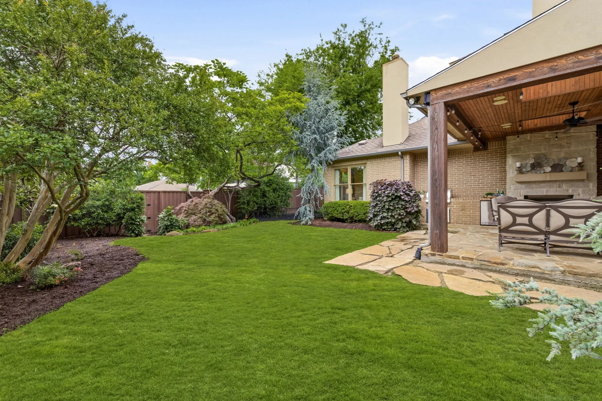 Well landscaped backyard with room for a pool.
