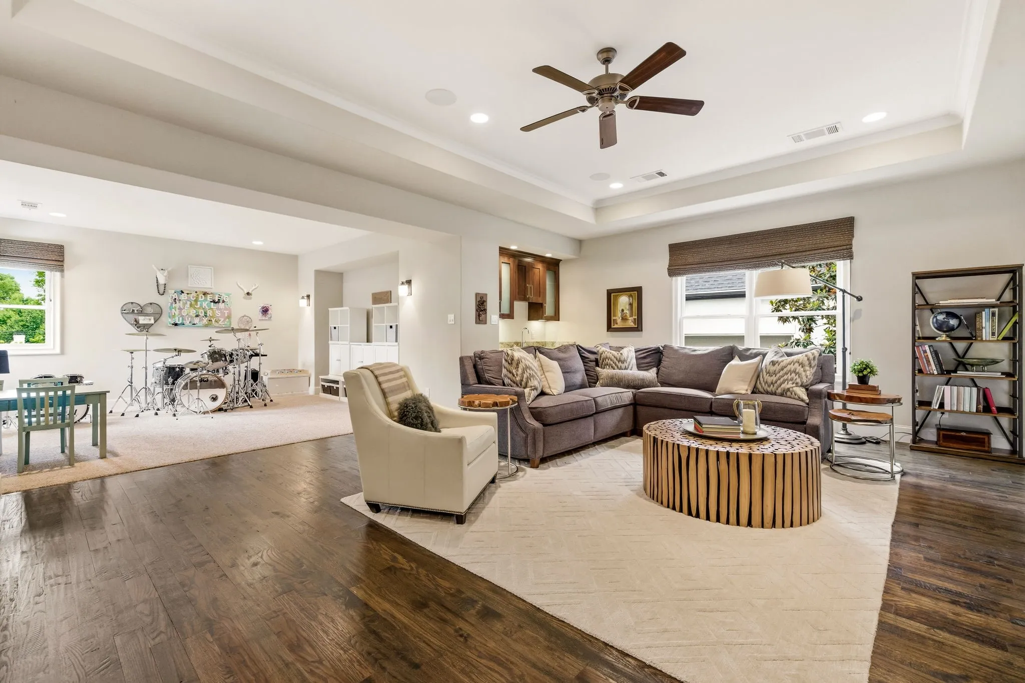 Large open game room with wet bar and beverage refrigeration. Can be divided to have a separate workout room, if desired.