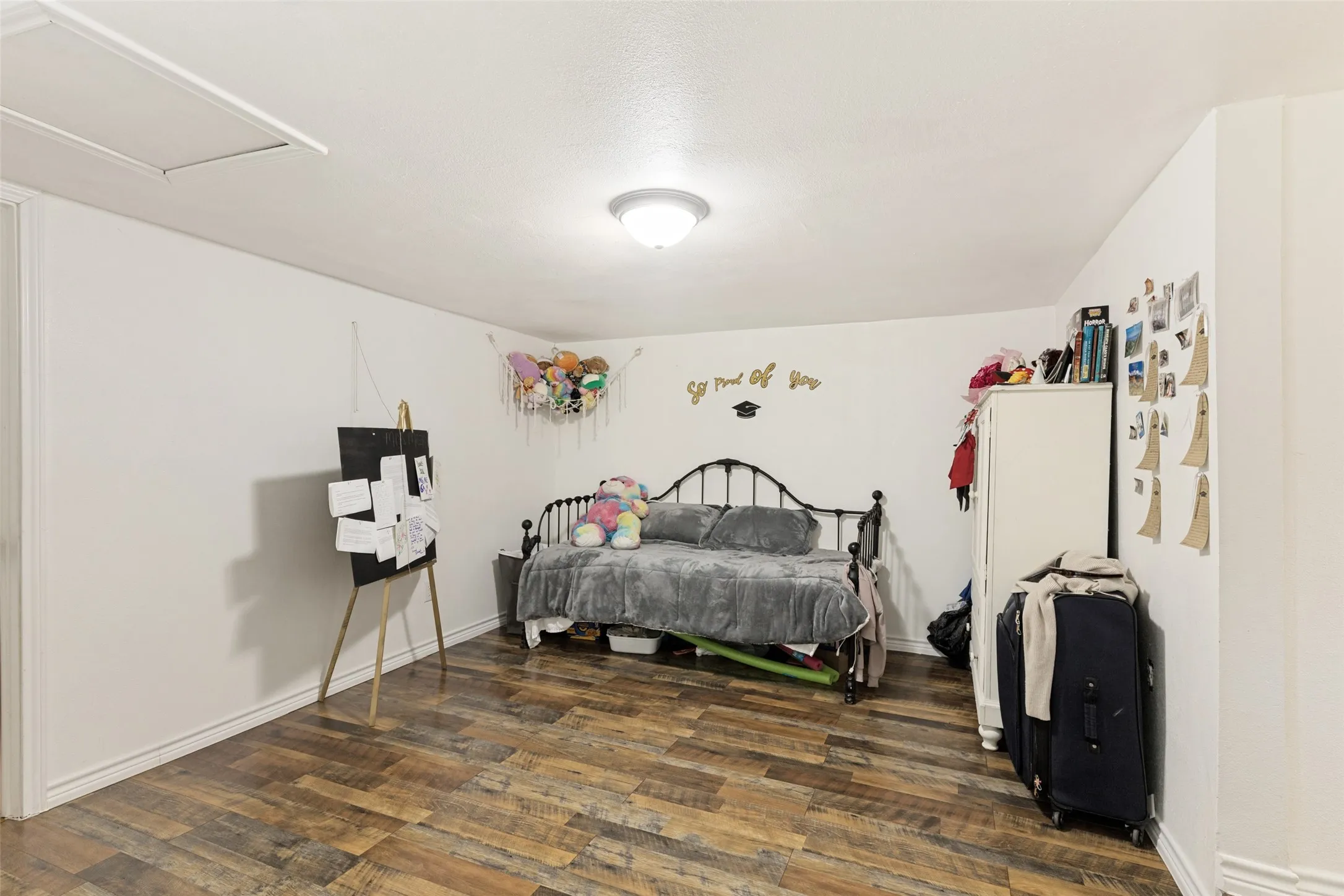 Wood-finish flooring with white walls