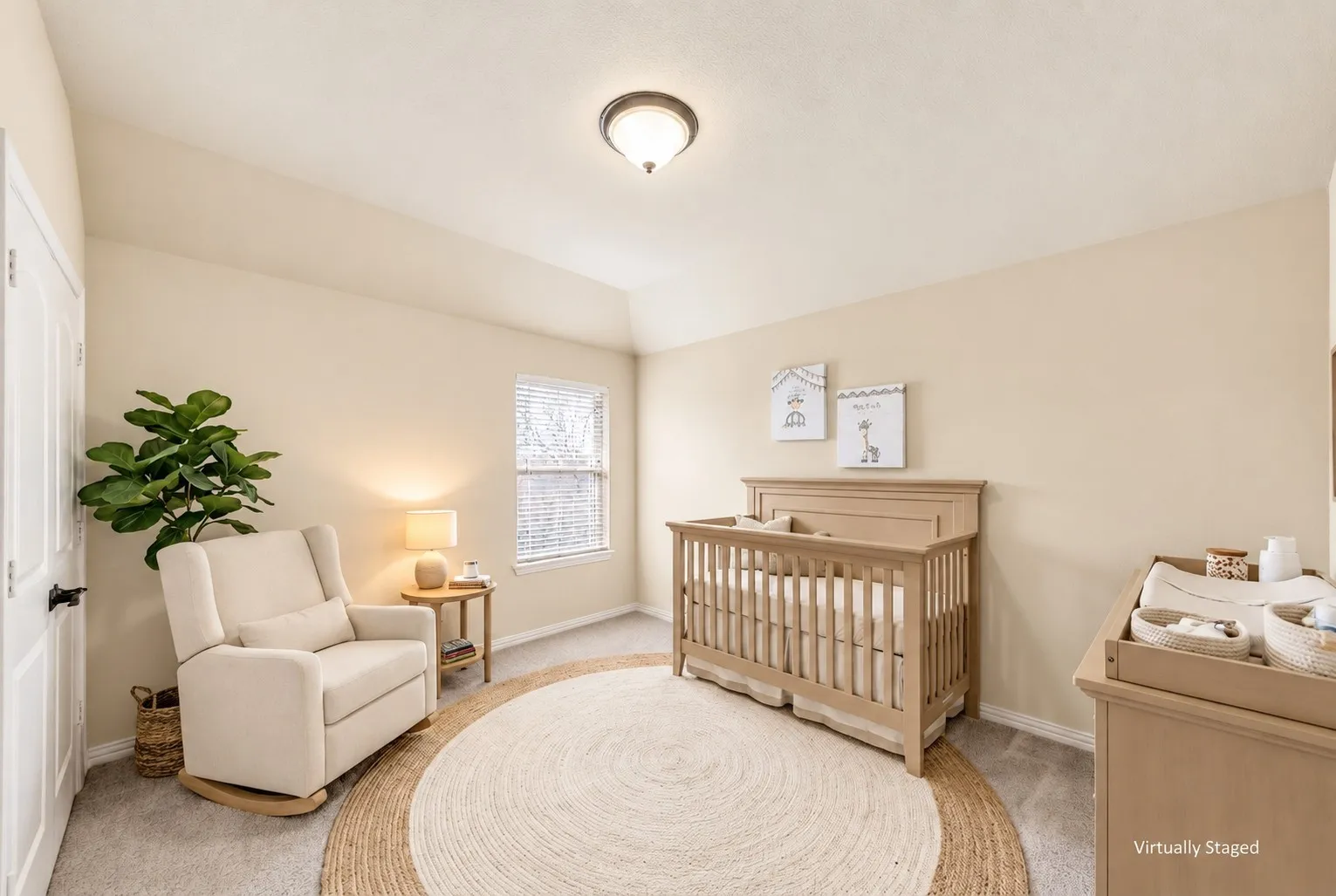 Room featuring neutral wall paint, a single window with blinds, and textured carpeting