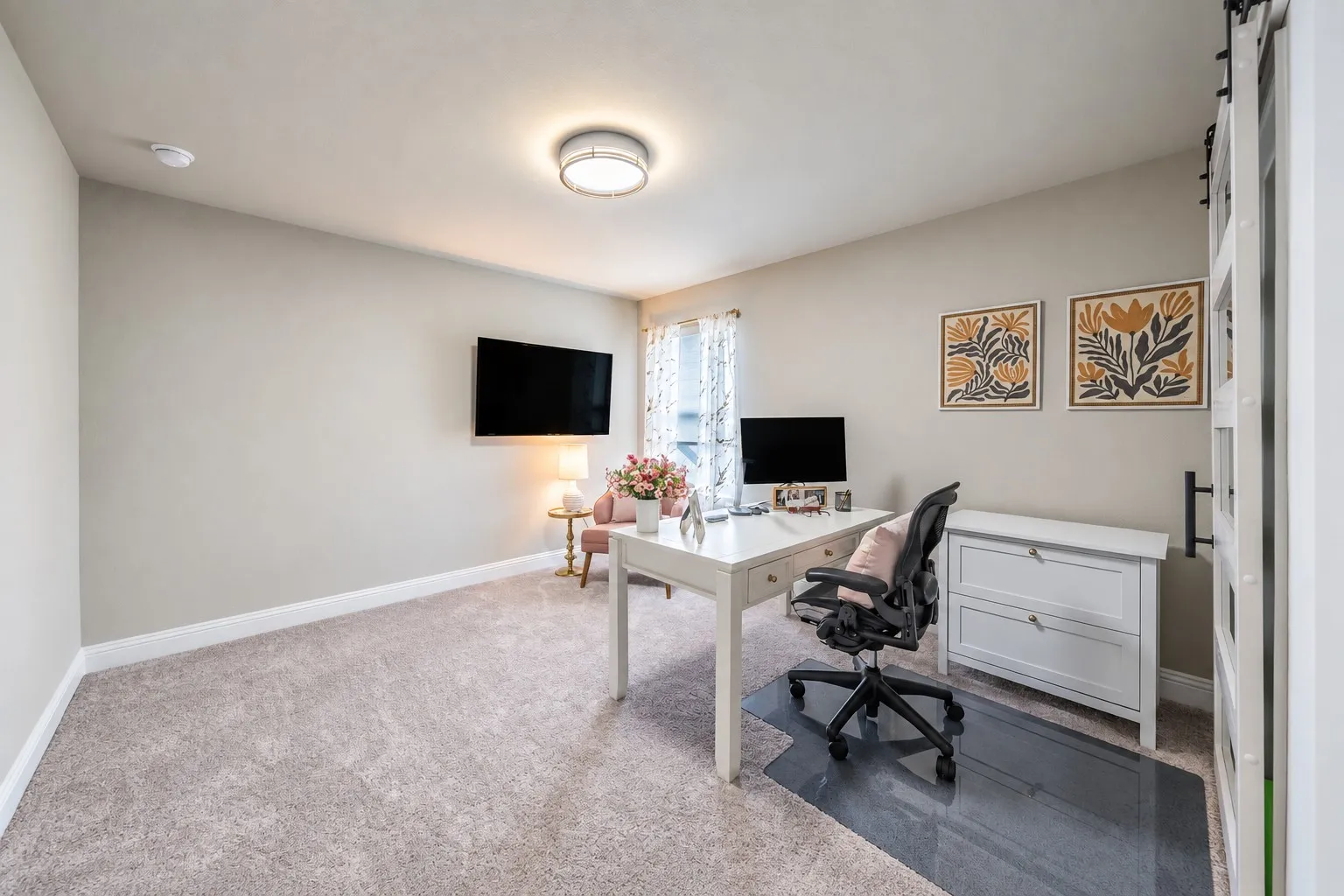 This is bedroom 3 which is being used as an office currently. Notice the decorative lighting.