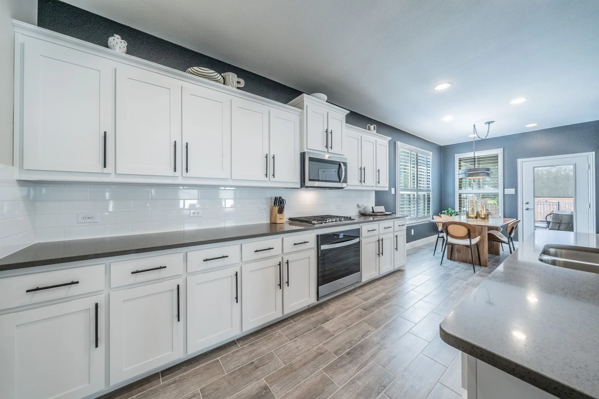 Another view of the kitchen facing the breakfast room - so much storage! Notice the upgraded drawer pulls.