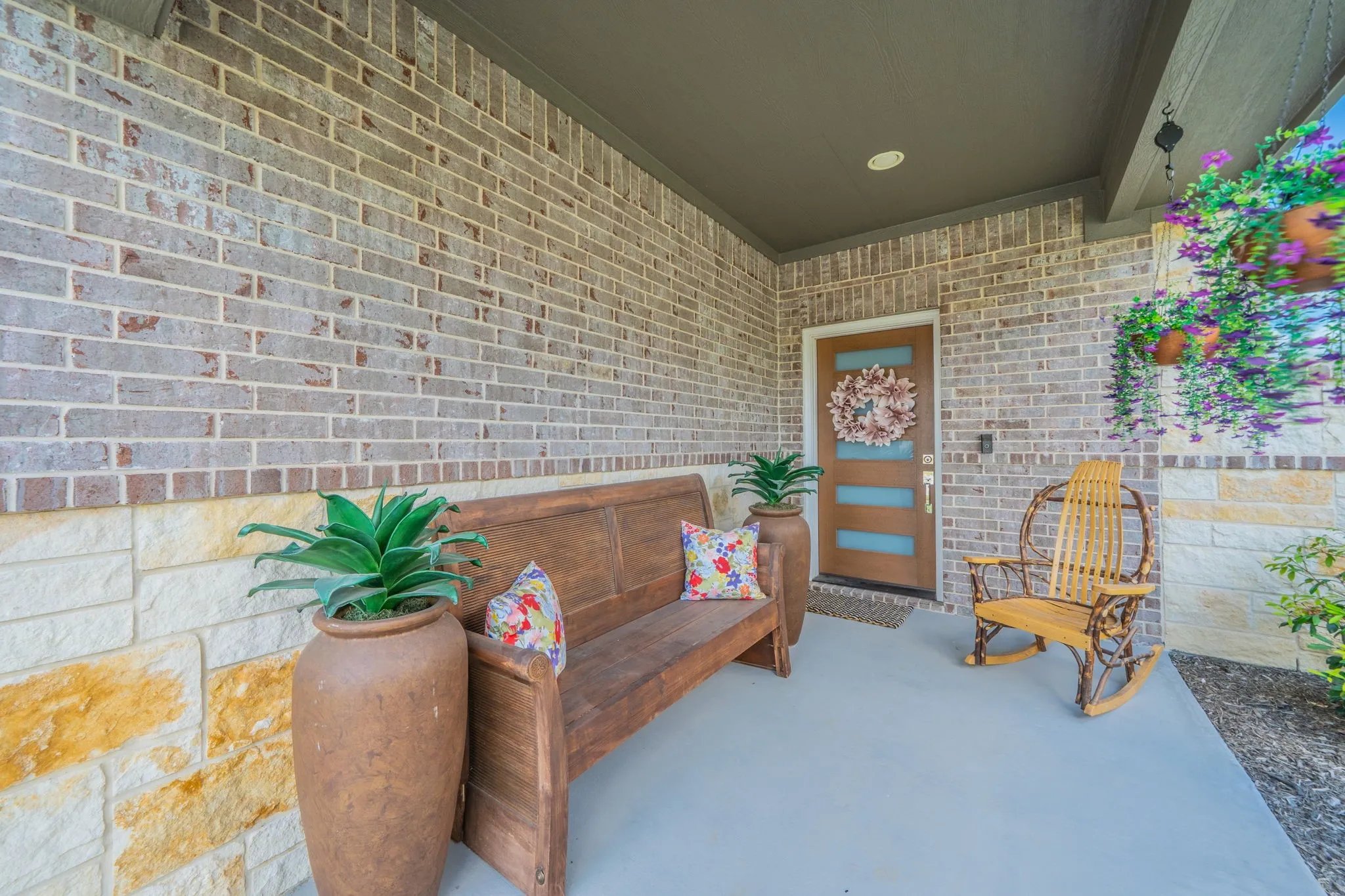 Large covered porch welcoming you inside!