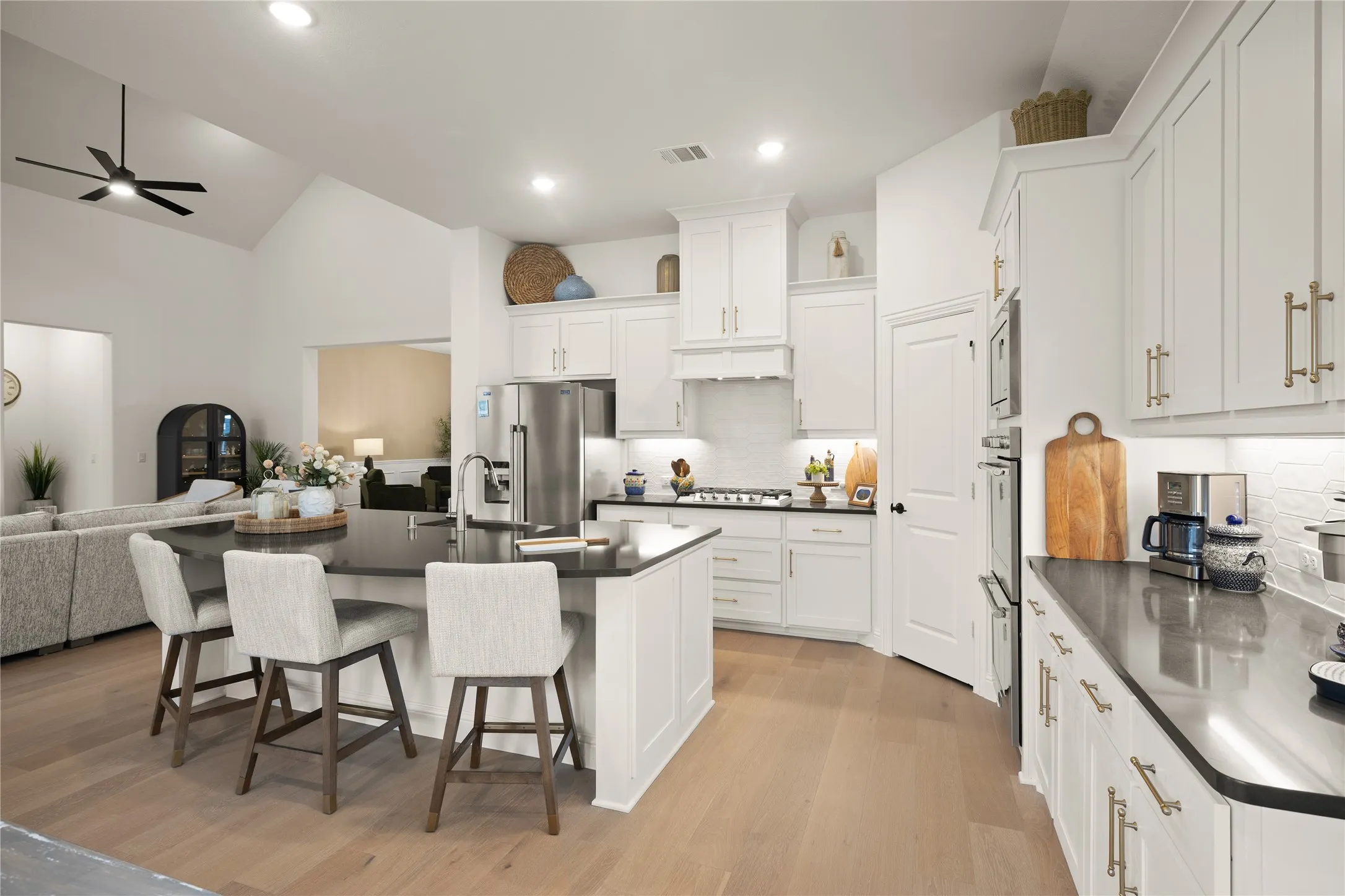 Eat in kitchen, with luxury applainces and expansive island and prep spaces that make this a chefs dream kitchen. Bulters area for serving and storage or a dedicated coffee bar space.