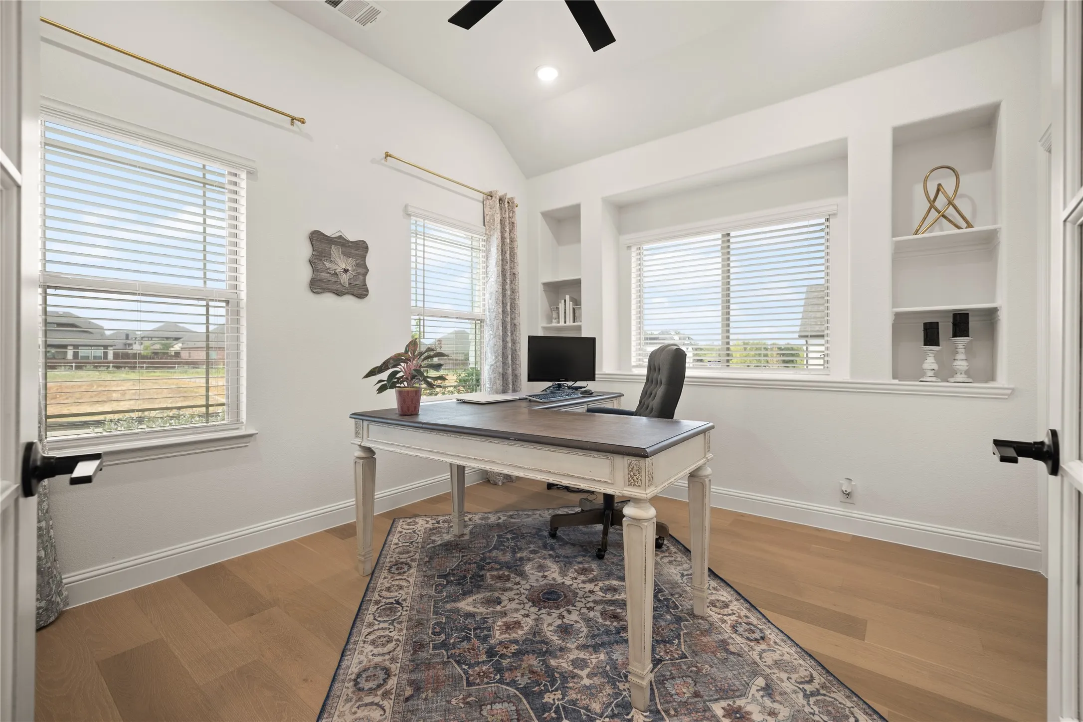 Great office view or your 4th bedroom built with a nice closest and wall storage accents.