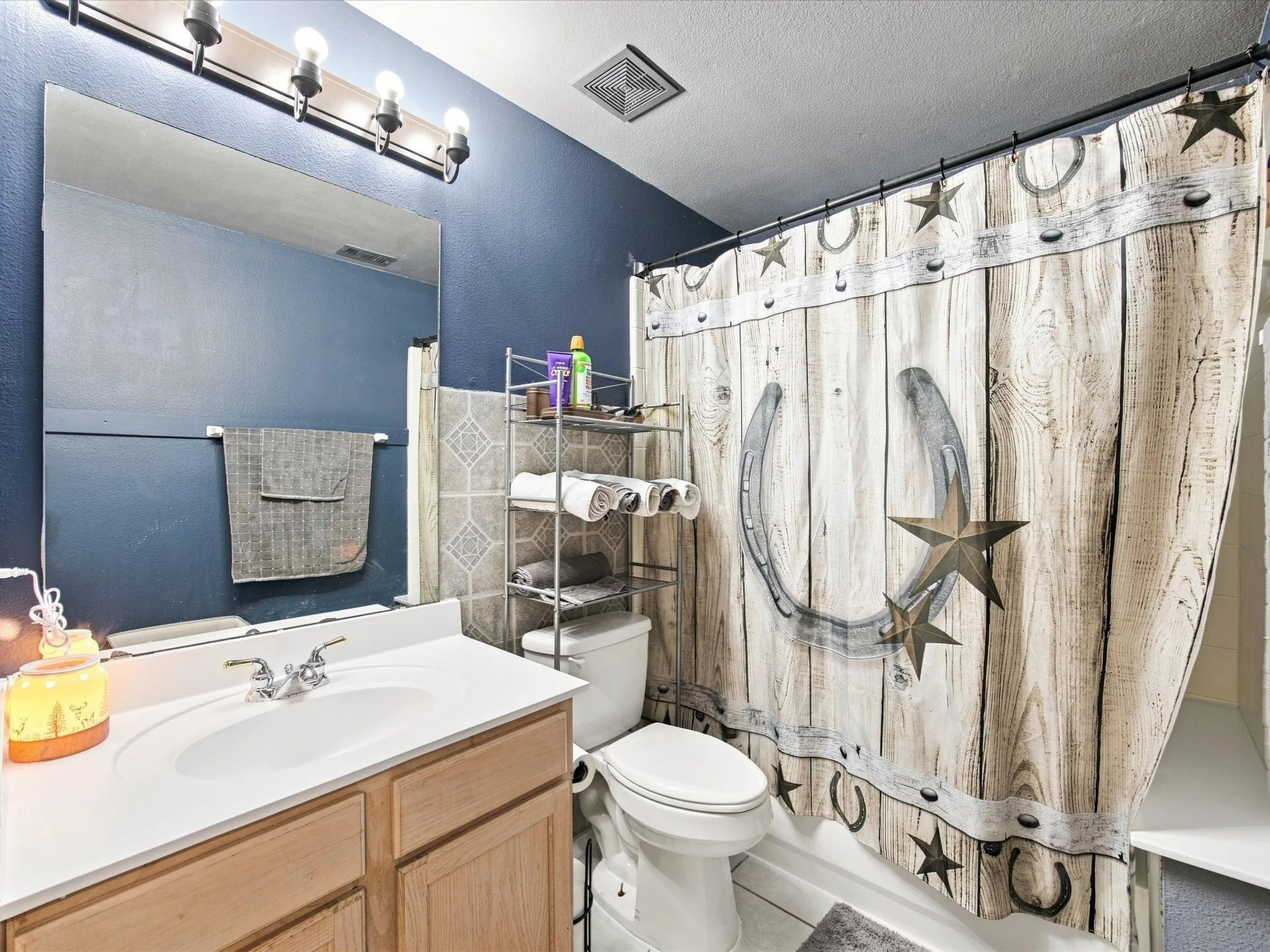 Single vanity with a laminate countertop and undermount sink