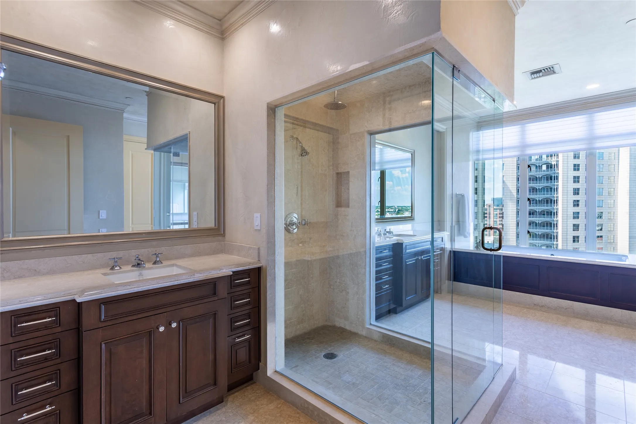 Primary Bath has dual vanities and dual water closets.