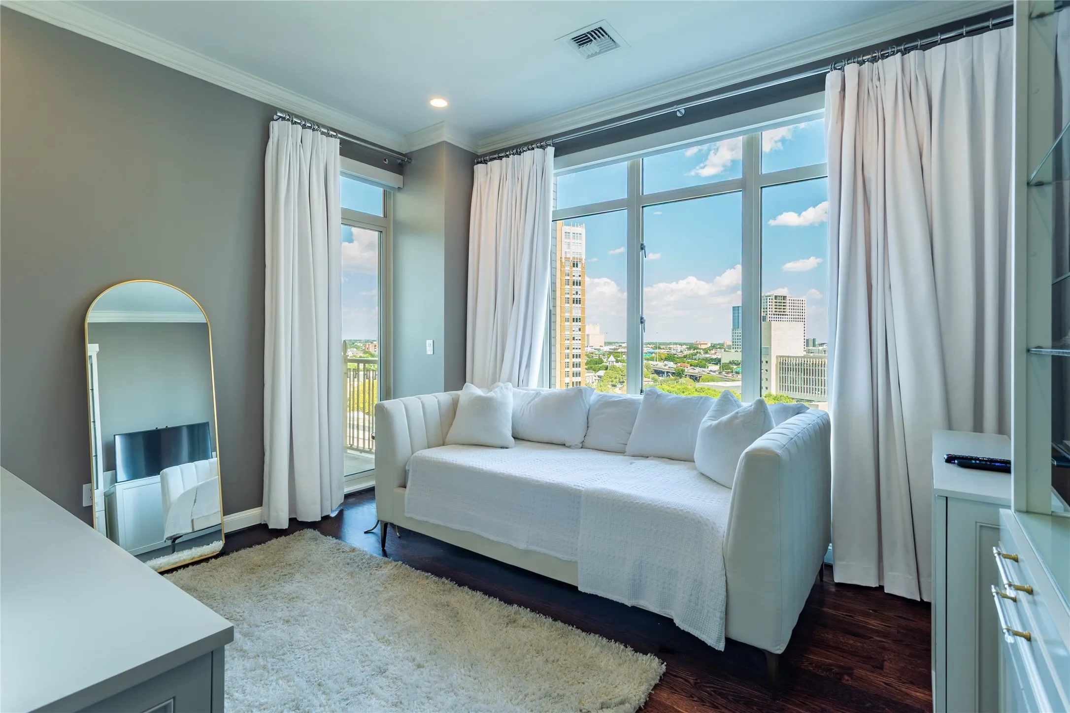 Study with a daybed for overflow guests opens to the Balcony.