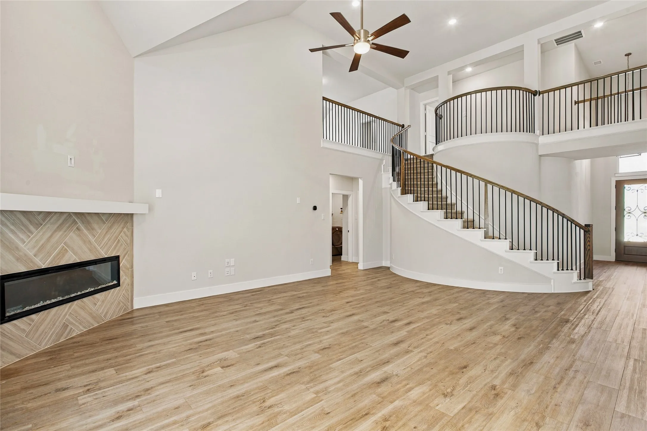 Dramatic fireplace and staircase