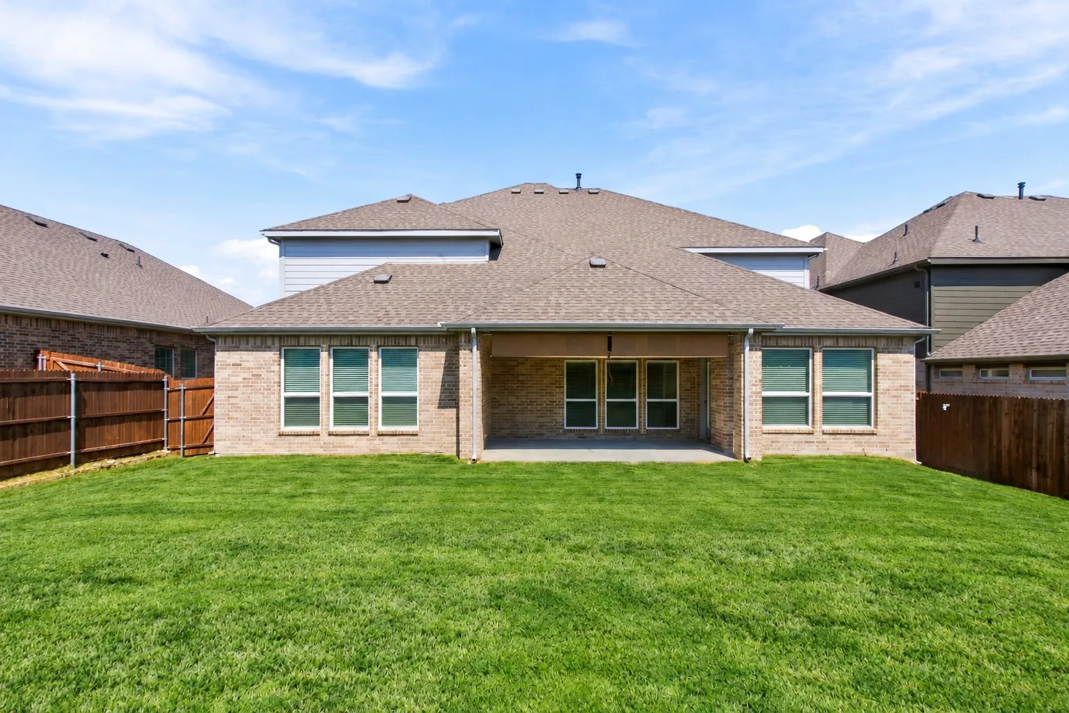 Back patio offers sunshades