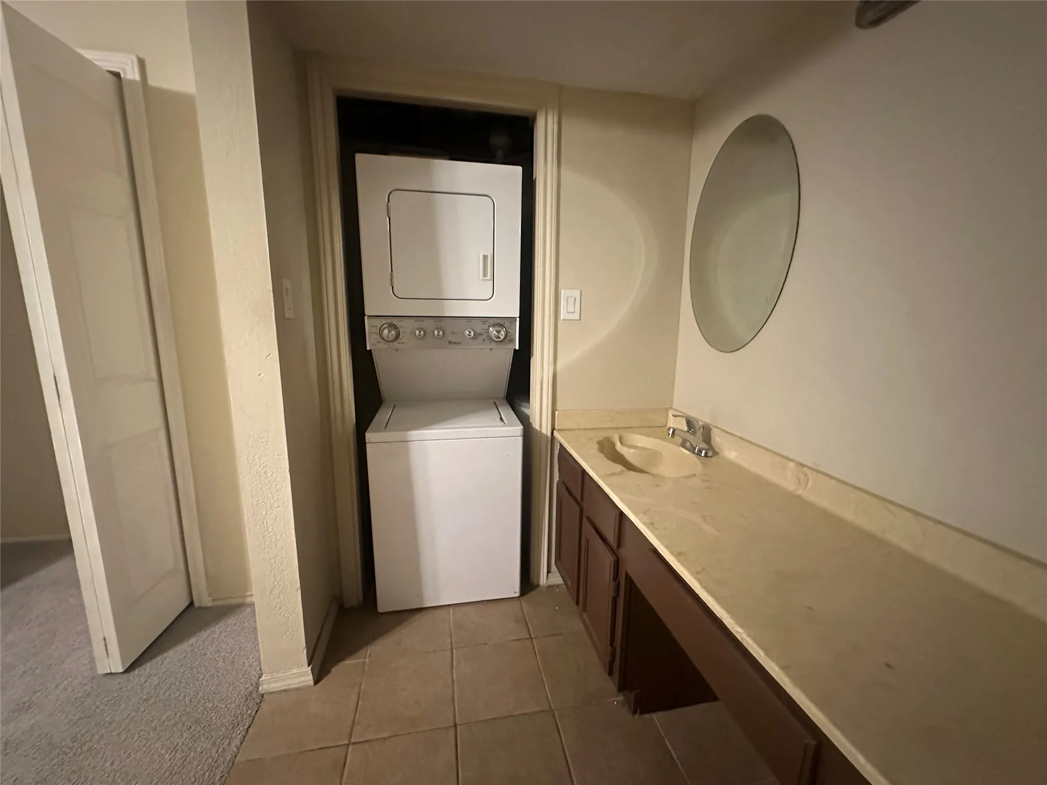 Built-in vanity with integrated sink, expansive countertop, and under-counter storage