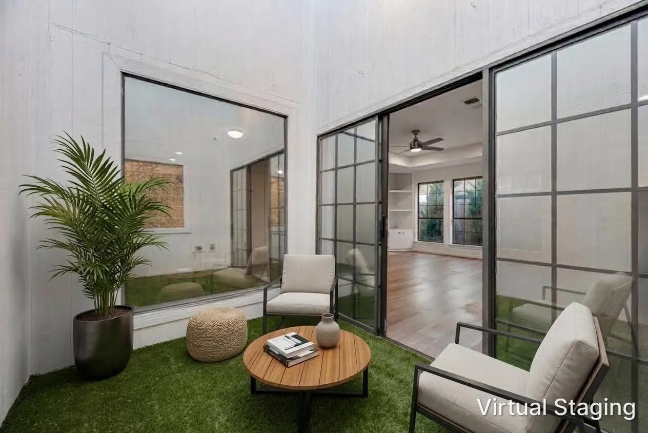 Enclosed patio with artificial turf, large fixed window, and sliding panel doors