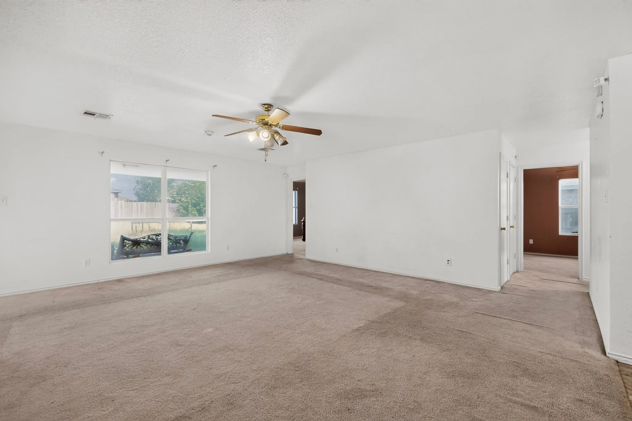 Neutral-toned carpeting throughout