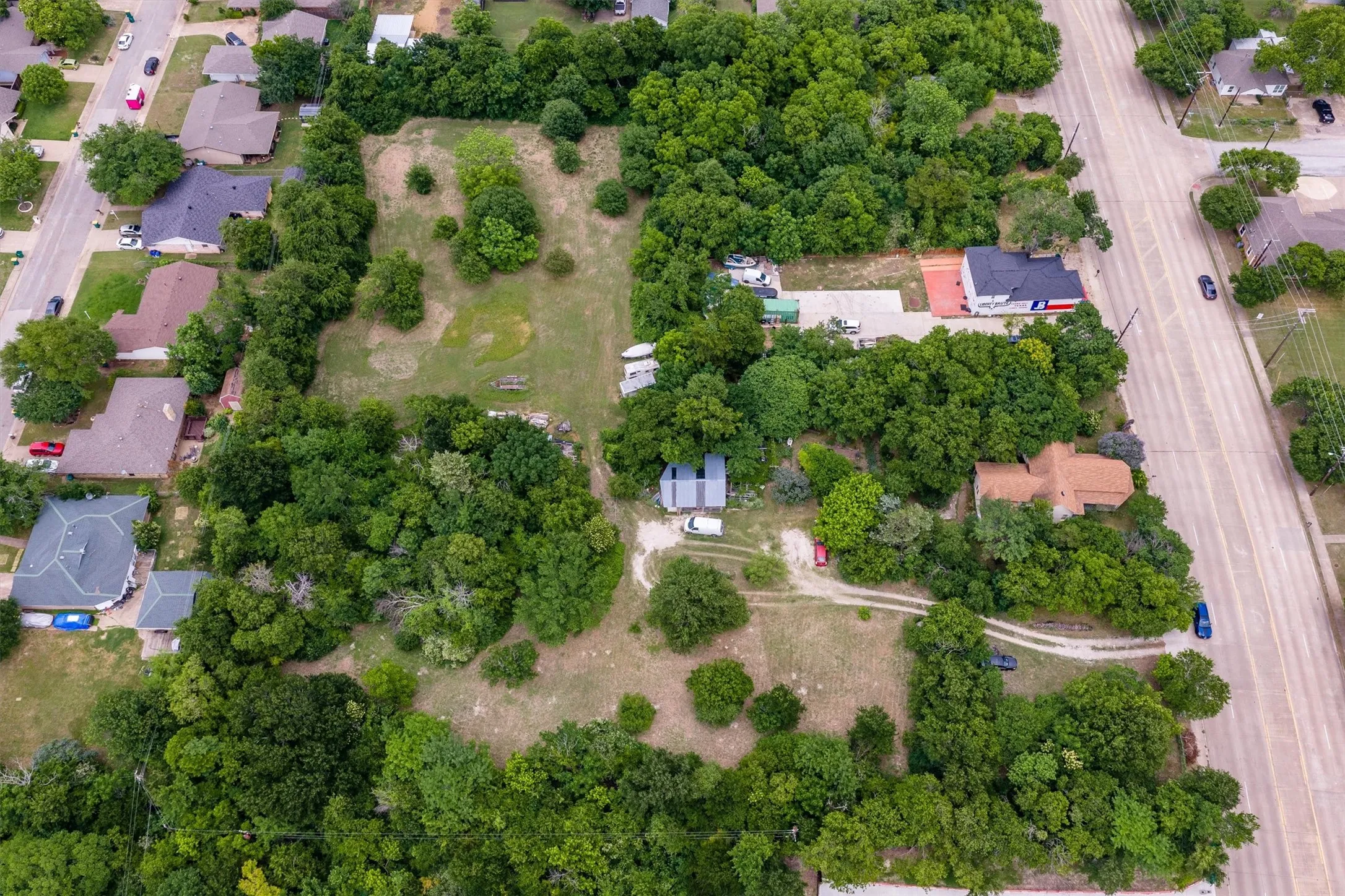 Expansive lot featuring mature trees and open clearings