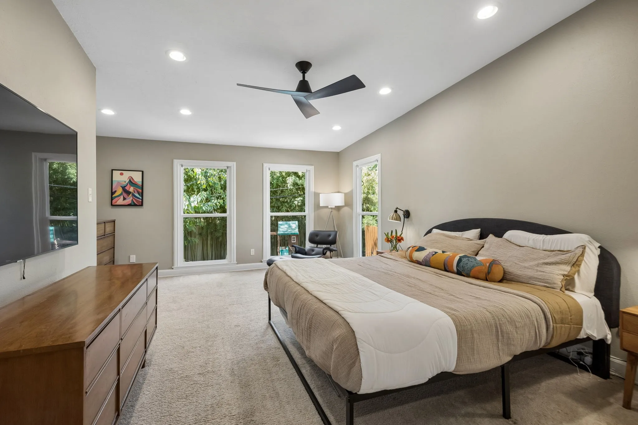 Huge primary suite with amazing views of the backyard.