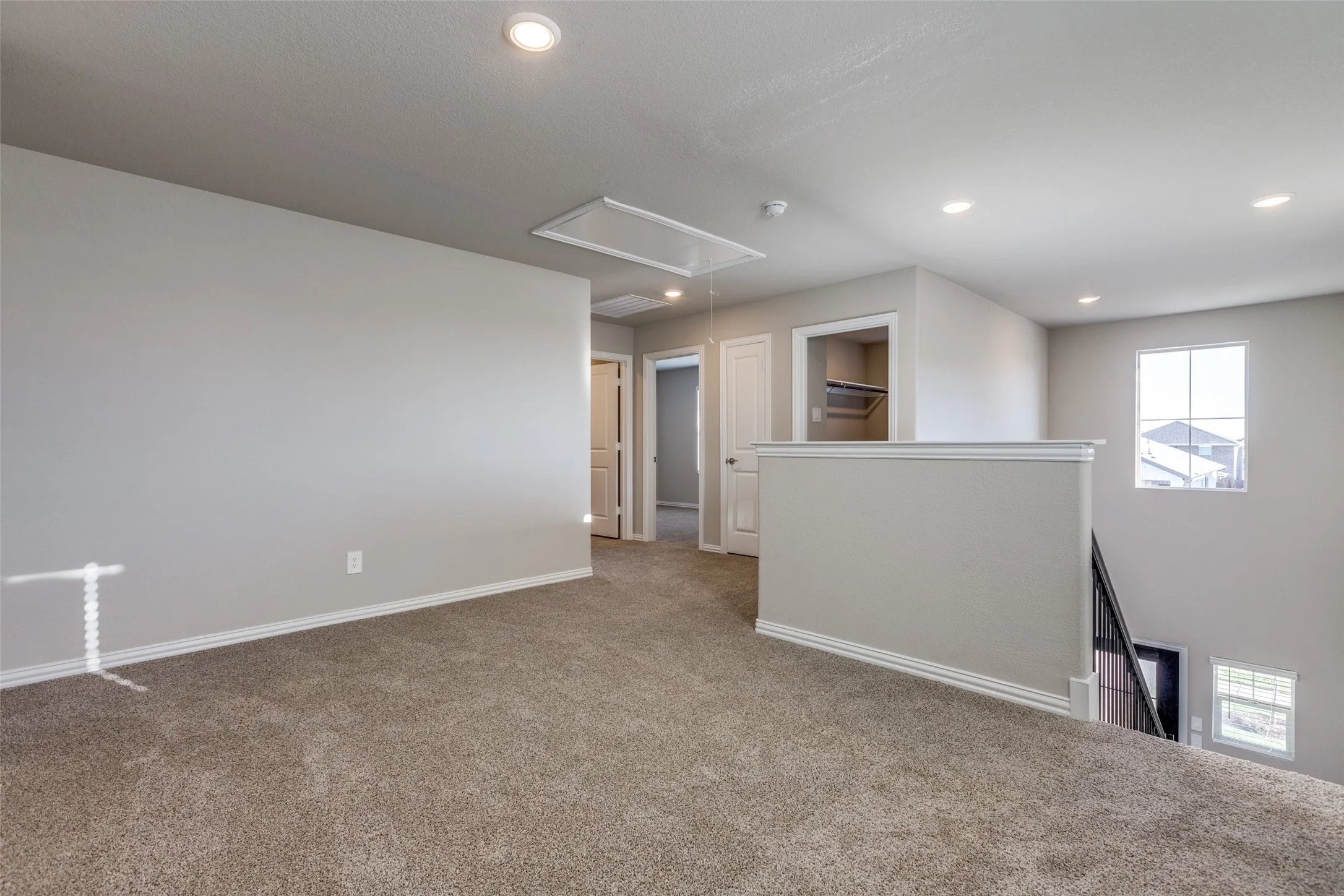 Unfurnished room with carpet flooring