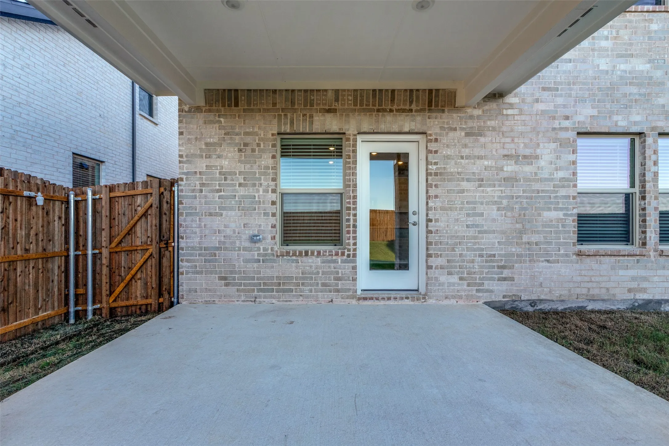 Property entrance featuring a patio