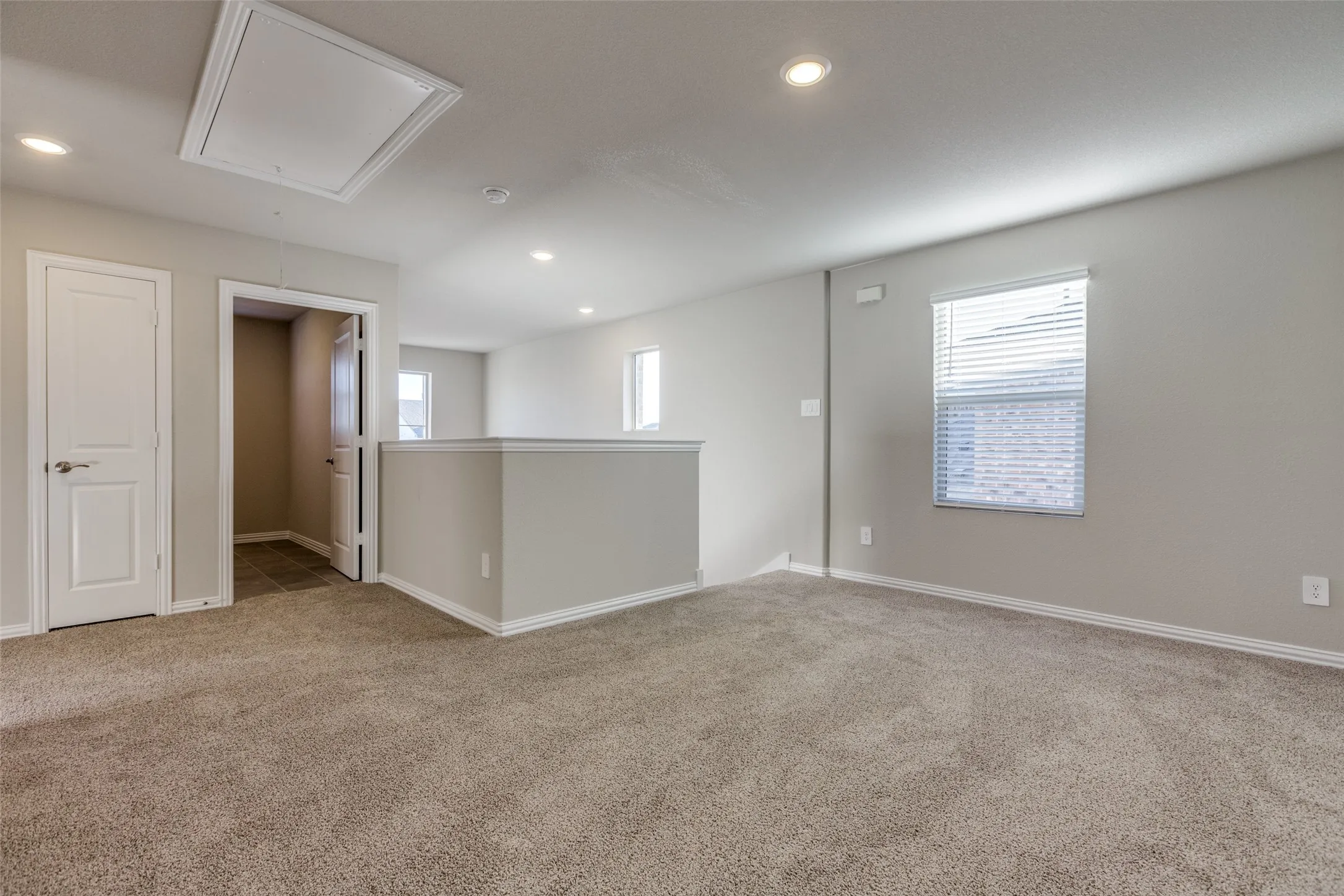 View of carpeted spare room