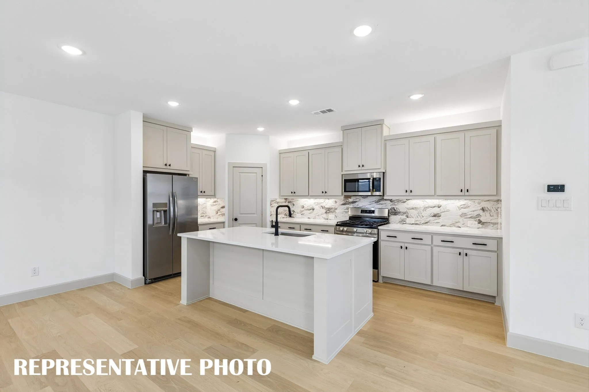 Packed with space, storage and style, this dream kitchen is waiting for you to call it your own!  REPRESENTATIVE PHOTO