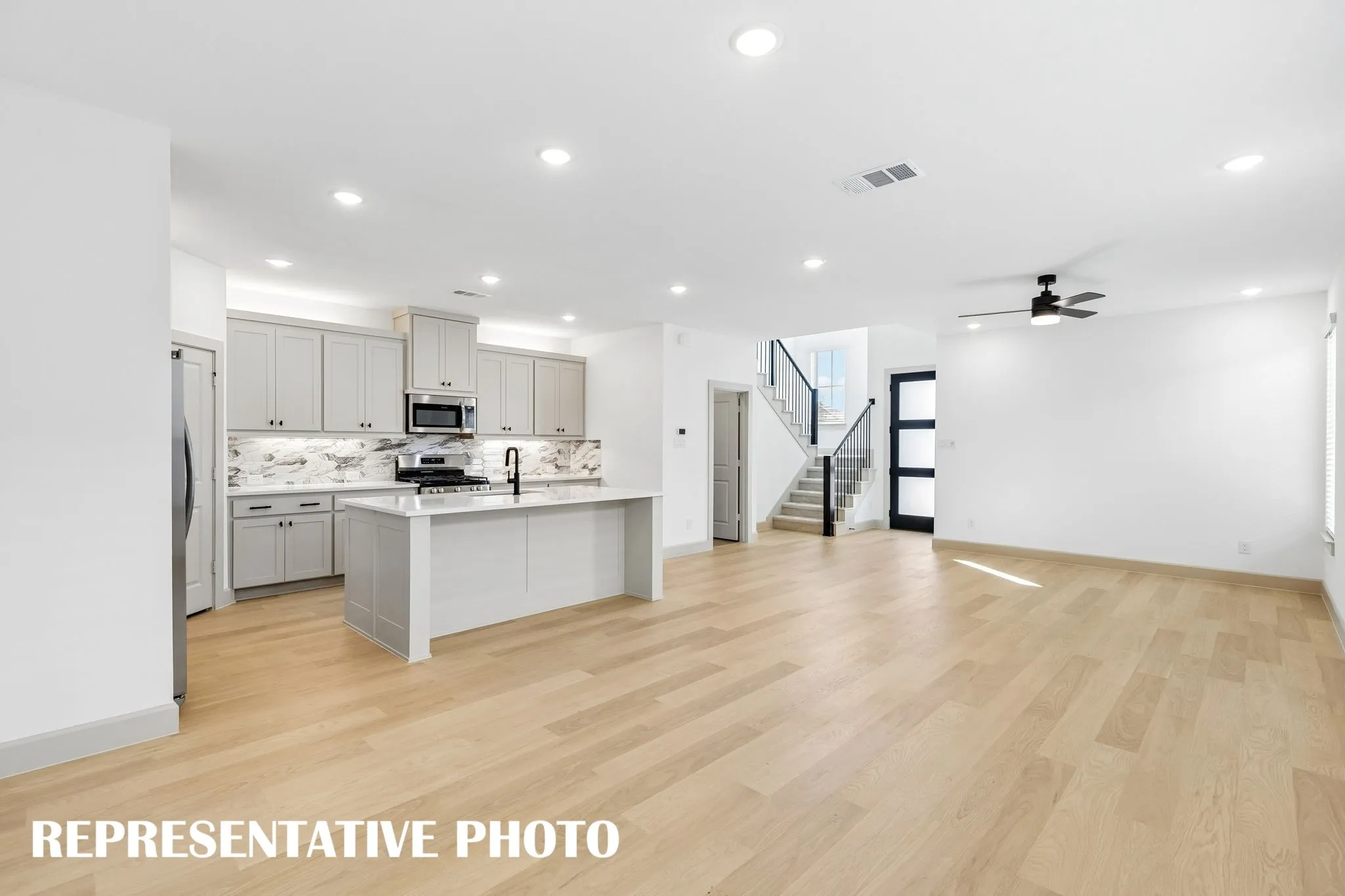 Open and flowing, this delightful floor plan was designed for entertaining.  REPRESENTATIVE PHOTO