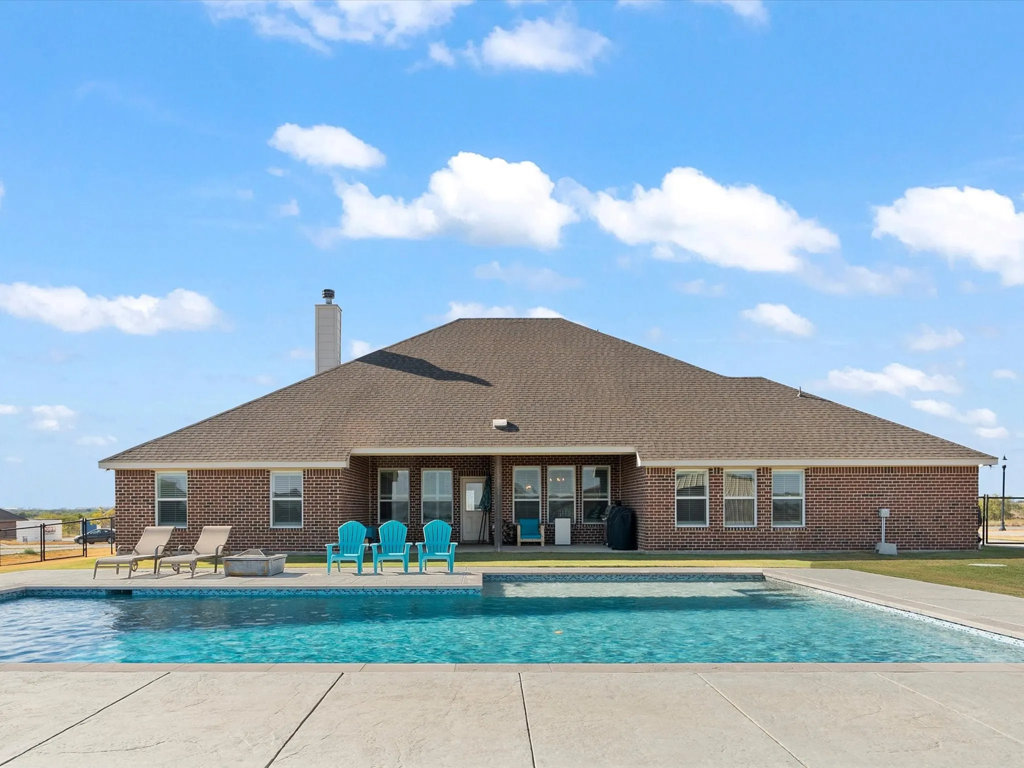 back patio, chlorinated pool and decking
