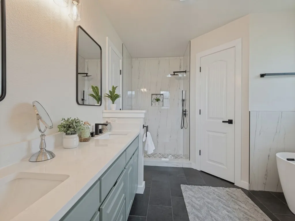Dual vanity with light-toned countertop, sleek black hardware, and integrated sinks