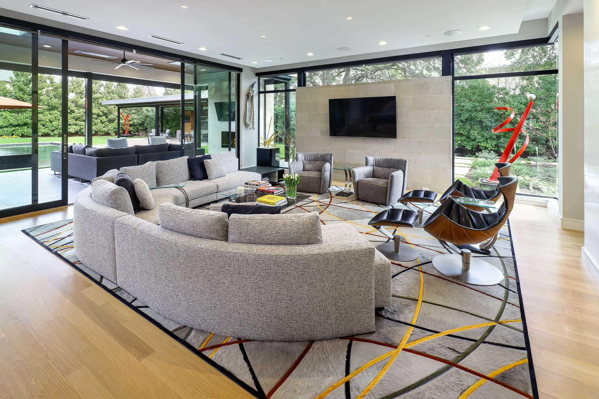 Family room with sliding doors to covered outdoor loggia