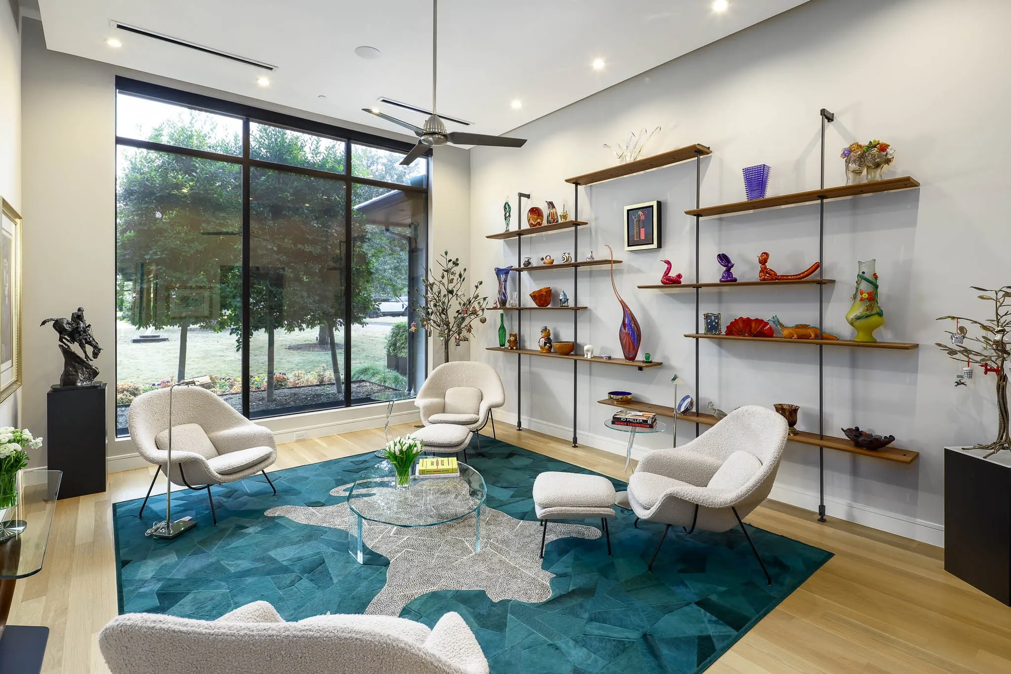 Formal study with custom built-in shelving and private desk area