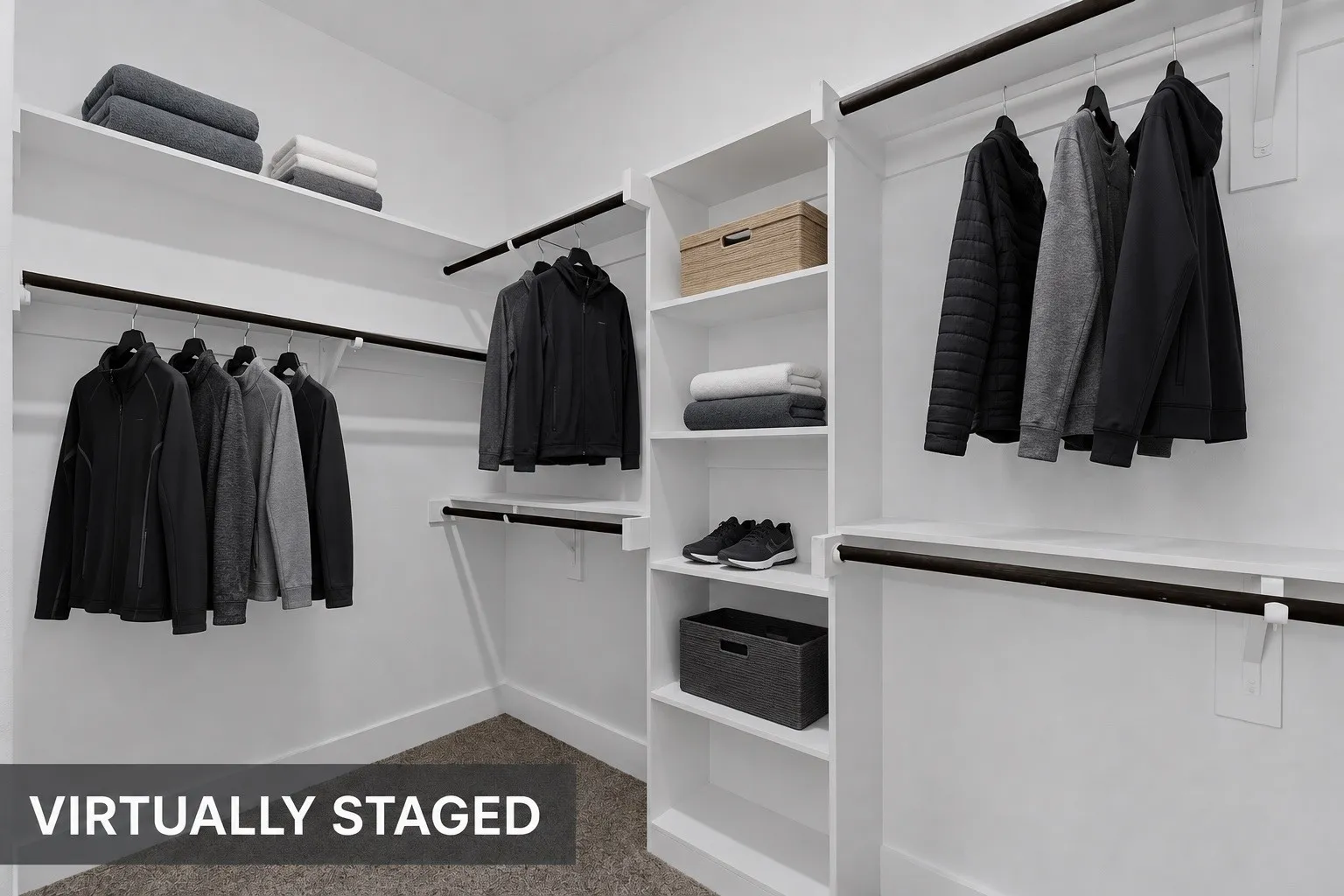 Custom closet system featuring white shelving, multiple hanging rods, and built-in storage compartments