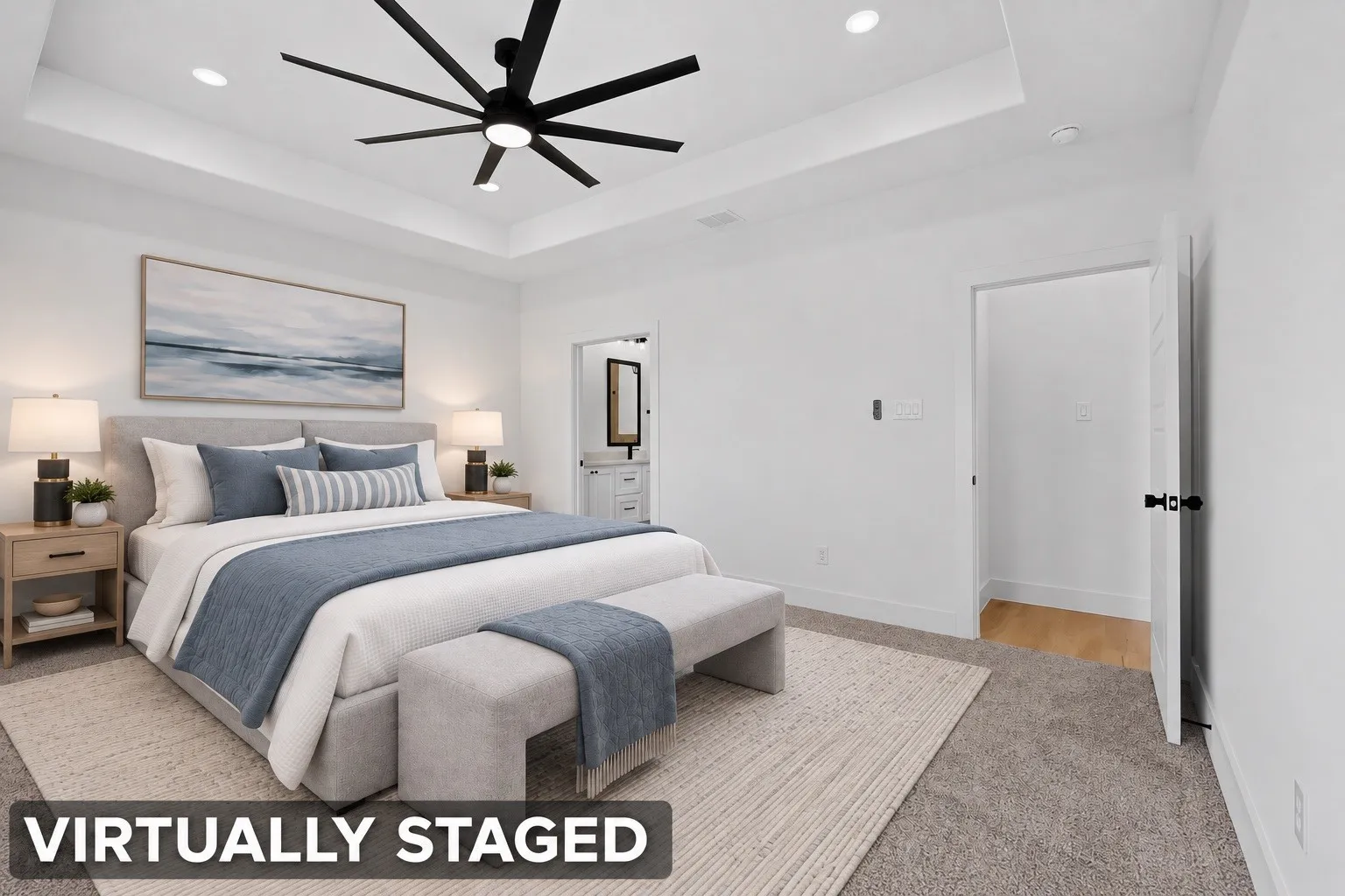 Tray ceiling with recessed lighting and a contemporary ceiling fan