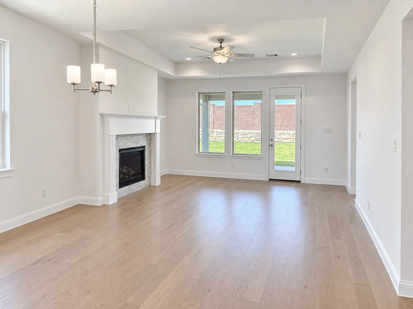Hardwood-style flooring throughout