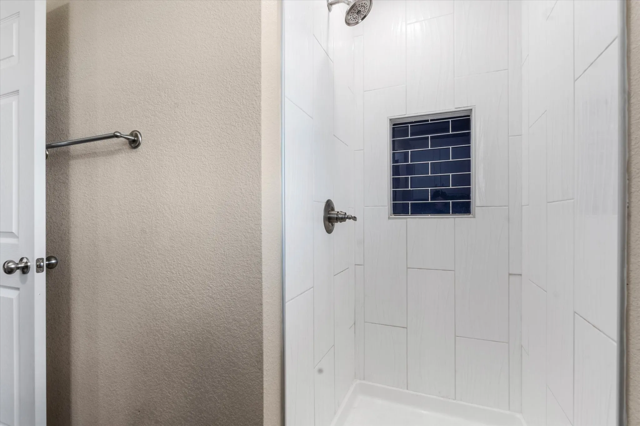 Bathroom with tiled shower