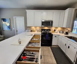 White cabinetry with under-cabinet lighting