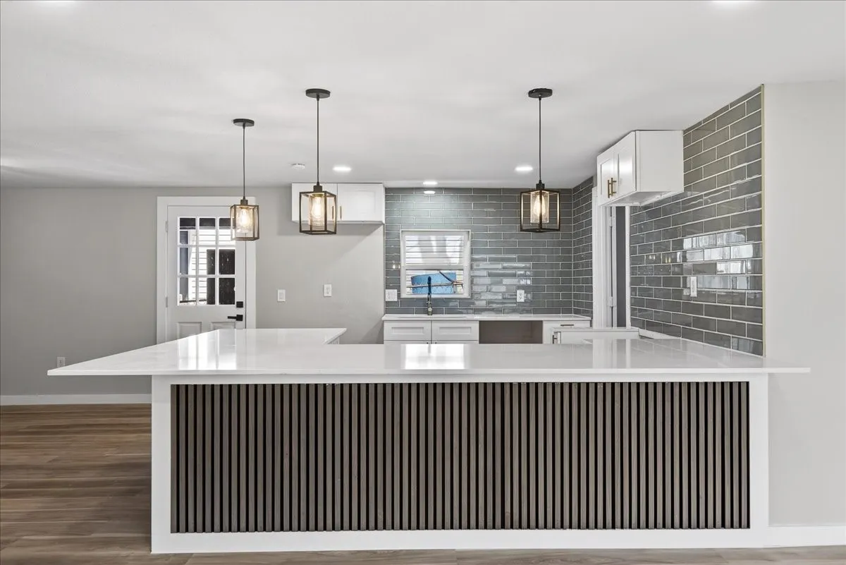 Kitchen with ample bar seating