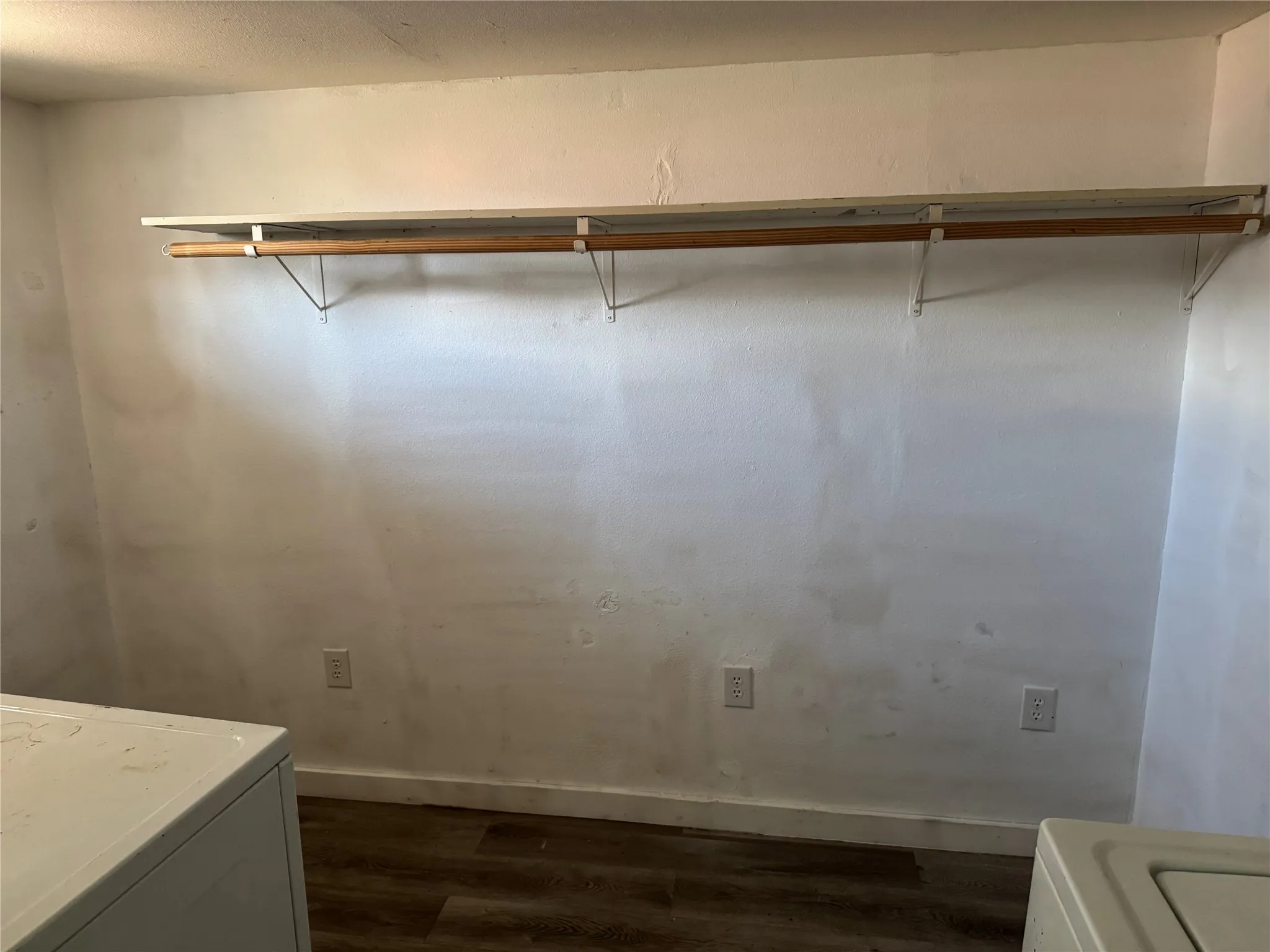 Large utility room. Washer, dryer, and fridge stay.