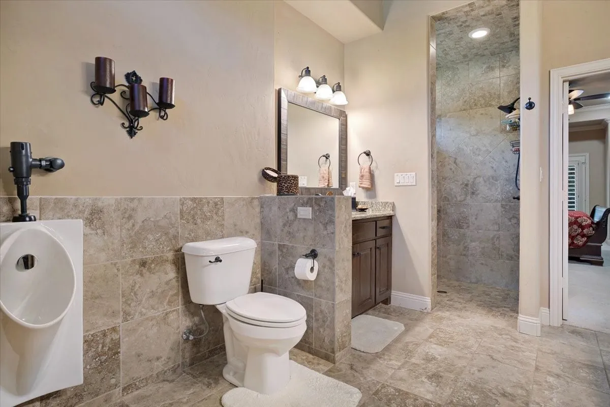 Stone-finish tile flooring and wall accents