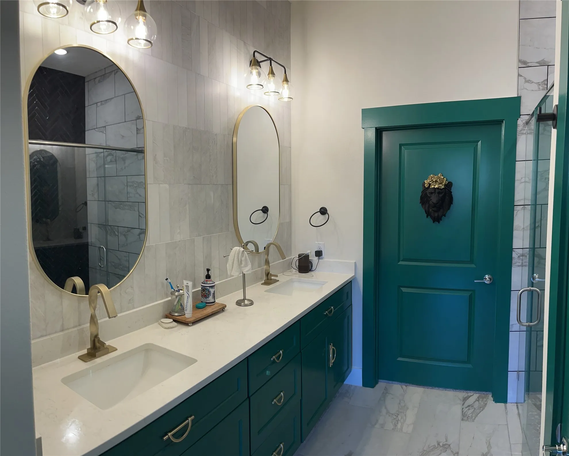 Gorgeous Emerald, green custom design bathroom with quartz countertop and marble backsplash accent wall
