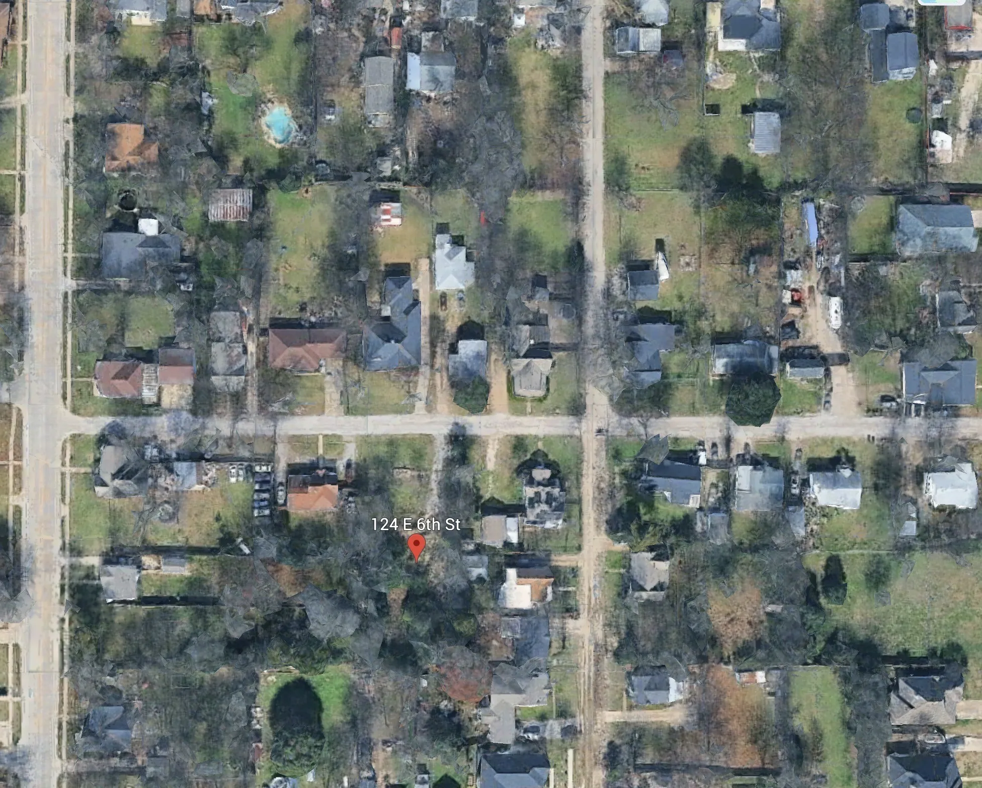 Aerial Map. Depicting the property location at 124 E 6th St and surrounding structures