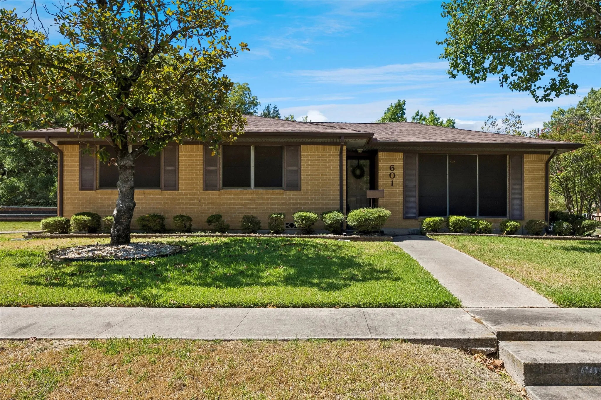 Charming 1950's vintage three bedroom, two and half bath gem located on a large corner lot in the desirable Joy Acres Subdivision.