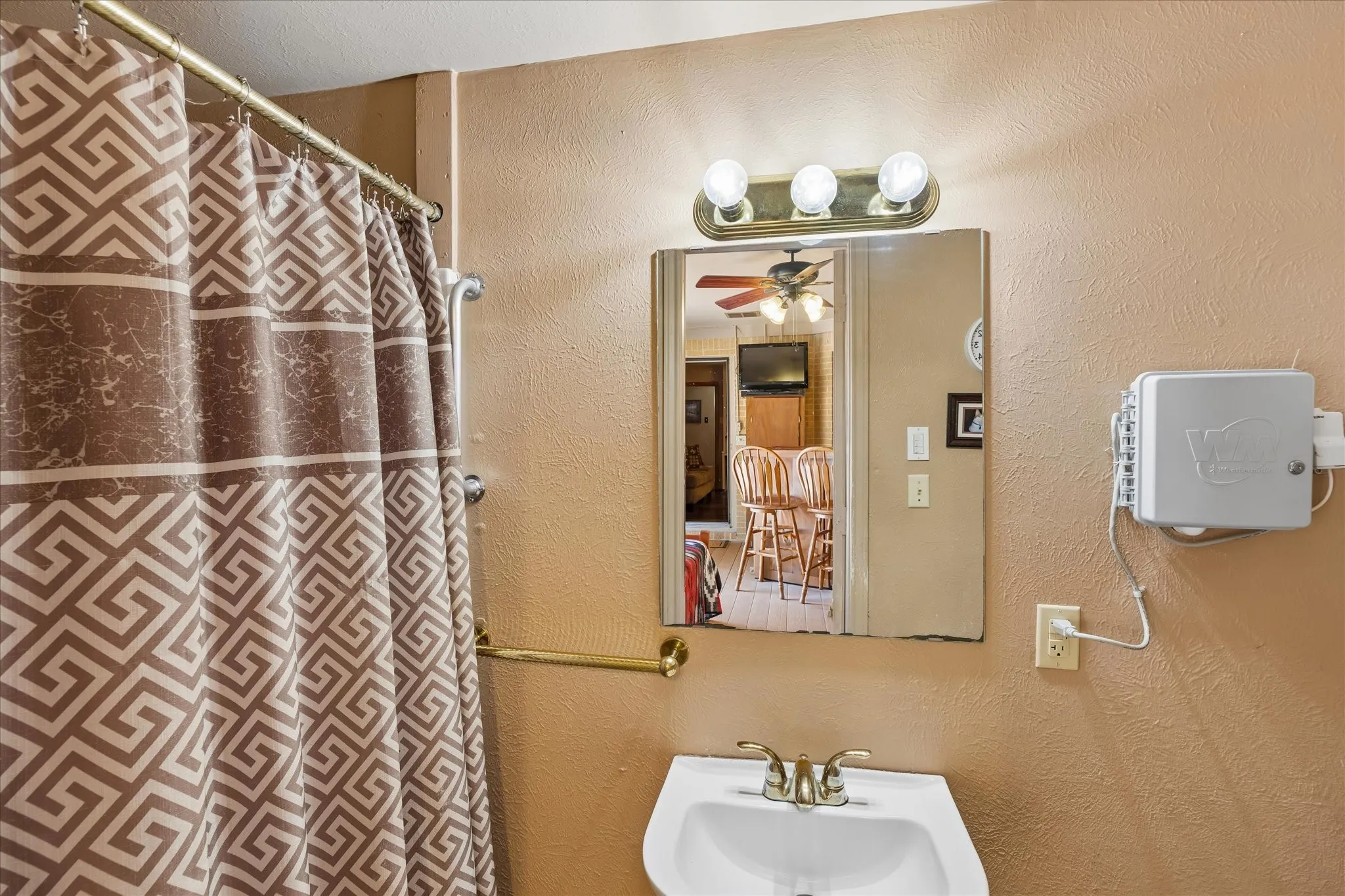 Full bath located in game room.