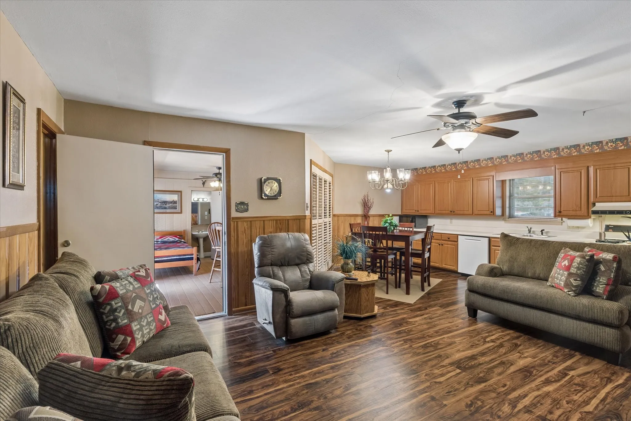 This well-maintained home features an eat in kitchen with refaced cabinets and a gas range that blends seamlessly to the family room with built-ins.